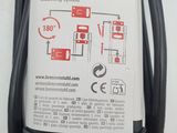 a picture of a battery charger with a red and white label