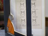 a picture of a picture of a cat in a picture frame