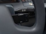 a close up of a steering wheel in a car