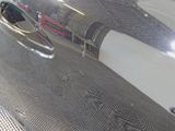 a close up of a car ' s hood with a mirror on it