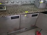 a kitchen with a stove, oven, sink and other appliances
