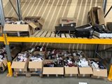 many boxes of assorted electronics on a shelf