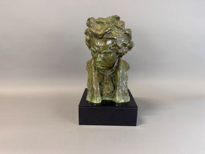 bronze sculpture of a man with a beard on a black base