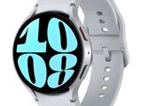 une image représentant une montre connectée blanche dont le cadran émet une lueur bleue