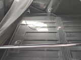 a picture of the inside of a car with the back seats folded down