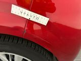 a sticker on the side of a red car that says vpauto