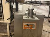 a machine that is sitting on the floor in a room