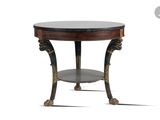 an image of a round table with a marble top and metal legs