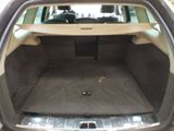 a trunk of a car with the back seats folded down