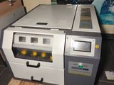 a machine that is sitting on a pallet on the floor