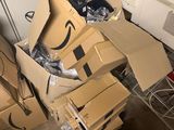 a pile of cardboard boxes that are stacked on top of each other