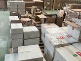a large warehouse filled with lots of boxes and boxes