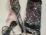 a hair brush and a hair dryer wrapped in plastic