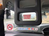 a sticker on the window of a car with a no smoking sign
