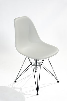 an image of a white chair with a wire base