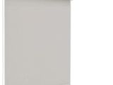 a close up of a white roller shade on a white wall
