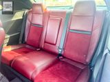 an image of a car with red seats in the back of it