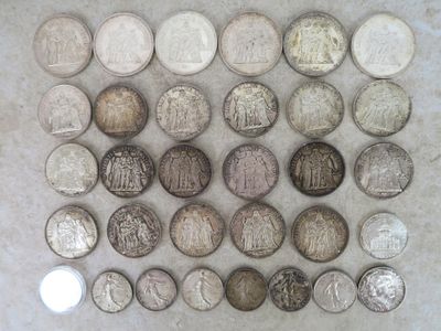 a lot of coins that are sitting on a table