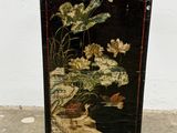 a picture of a painting on the wall of a room