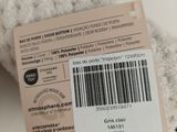 a label on the back of a stuffed animal