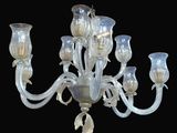 an image of a chandelier made of glass with flowers on it