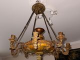 a chandelier that is hanging from the ceiling
