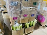 many boxes of toilet paper on the floor in the warehouse