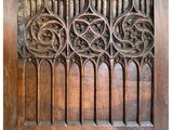 an old wooden panel with a star design on the top of it