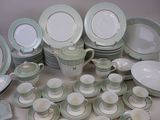 a lot of plates and cups on the table