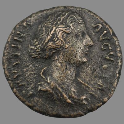 une pièce d'argent portant une tête de femme