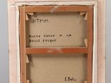 an old wooden easel with a piece of paper on top of it