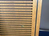 an image of a wooden door with a blue floor and a blue floor