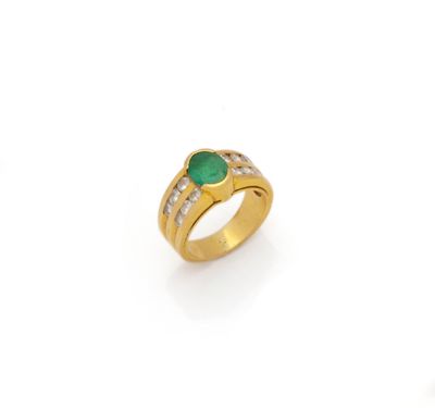 an emerald and diamond ring
