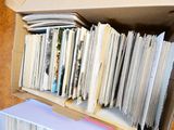 a cardboard box with a bunch of files in it
