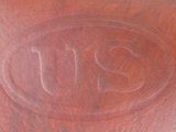 brown leather wallet with the u s logo engraved on it