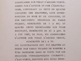 an open book with a black and white image of a number of words