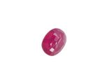 a close up of a pink gemstone on a white background