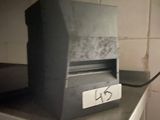 a toaster sitting on top of a counter in a kitchen