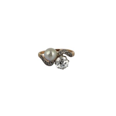an image of a pearl and diamond ring on a white background