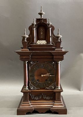 a clock that is sitting on top of a table