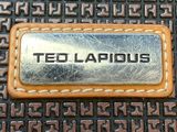 a metal plaque that says ted larious on it