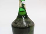 a bottle of alcohol that is sitting on a table