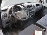 a picture of a car dashboard with a steering wheel in it