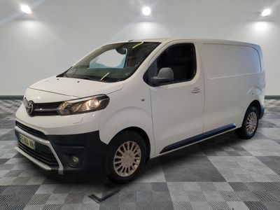 a picture of a white van on a checkered floor