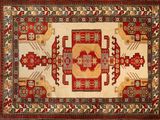 a red and beige rug with a medallion design on it