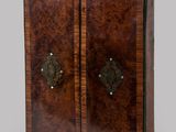 an image of a wooden cabinet with two doors and two handles