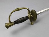 a sword that is sitting on a table