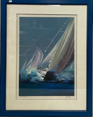 tableau encadré représentant un voilier sur une mer agitée, avec un cadre bleu