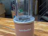 a nutribullet sitting on a wooden table