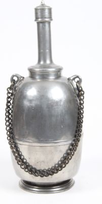 a silver vase with a chain around it on a white background